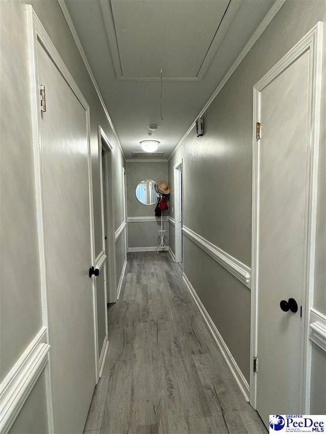 corridor featuring hardwood / wood-style flooring