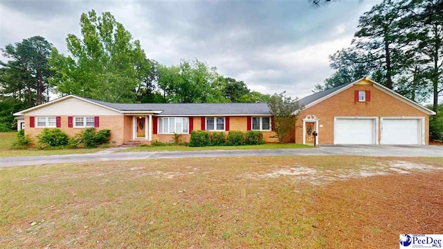 single story home with a garage