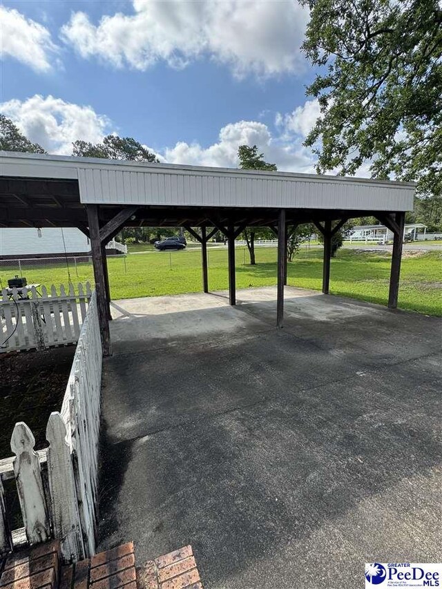 1816 Southern Acres Loop, Dillon, SC 29536 - view of parking featuring a detached carport