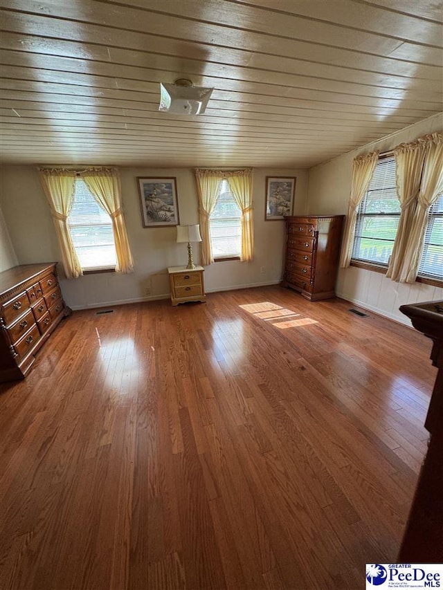 1816 Southern Acres Loop, Dillon, SC 29536 - unfurnished living room with wood ceiling and wood finished floors