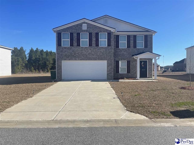 view of front of property with a garage