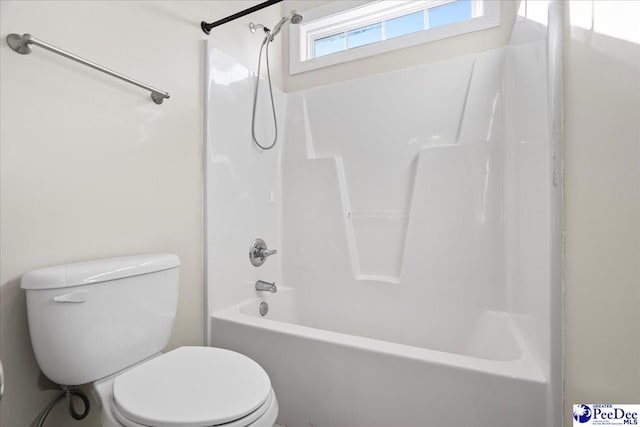 bathroom with  shower combination and toilet