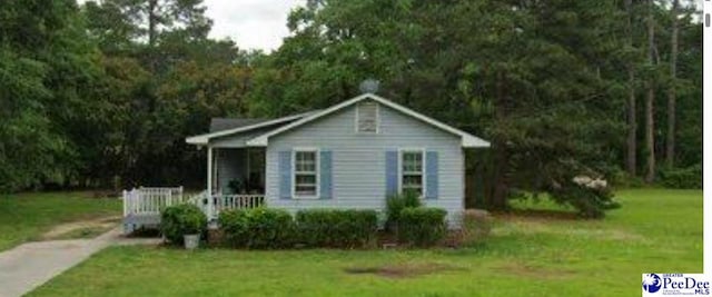505 Player St, Timmonsville, SC 29161 - view of front facade with a front lawn