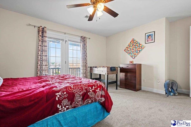 carpeted bedroom with access to outside and ceiling fan