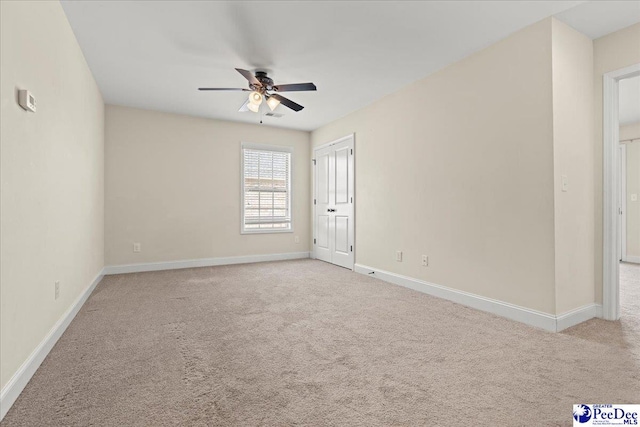 1635 Lake Wateree Dr, Florence, SC 29501 - unfurnished room featuring carpet, a ceiling fan, and baseboards
