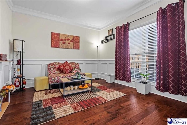 living area with crown molding, a healthy amount of sunlight, and dark hardwood / wood-style floors