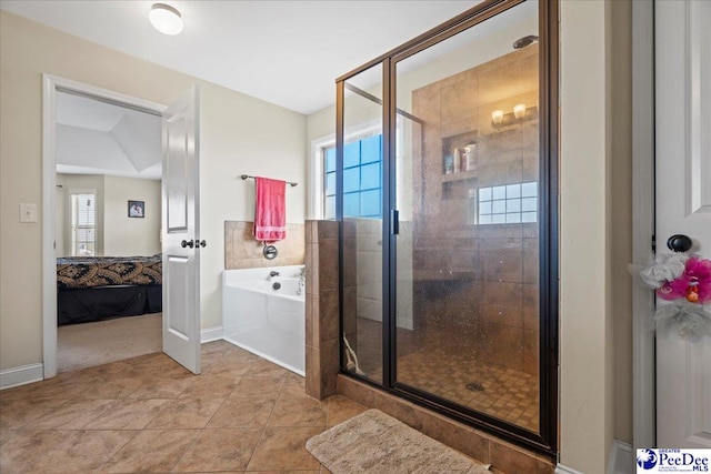 bathroom featuring tile patterned flooring, shower with separate bathtub, and a healthy amount of sunlight