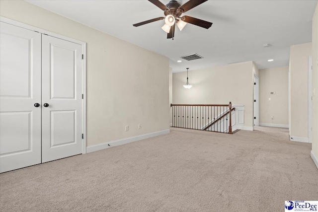 1635 Lake Wateree Dr, Florence, SC 29501 - carpeted spare room featuring ceiling fan, baseboards, visible vents, and recessed lighting