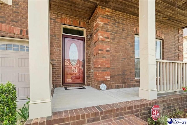1635 Lake Wateree Dr, Florence, SC 29501 - doorway to property with a porch and brick siding