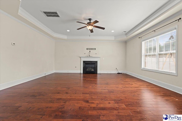 1635 Lake Wateree Dr, Florence, SC 29501 - unfurnished living room with ceiling fan, crown molding, wood finished floors, and visible vents