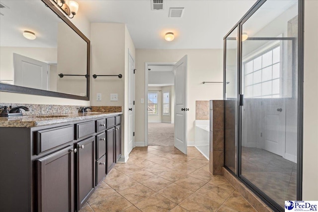 1635 Lake Wateree Dr, Florence, SC 29501 - bathroom featuring a shower stall, a bath, visible vents, and vanity