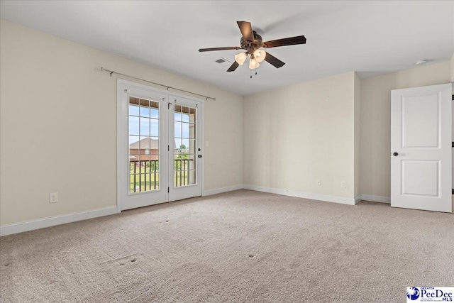 1635 Lake Wateree Dr, Florence, SC 29501 - unfurnished room featuring visible vents, a ceiling fan, baseboards, and carpet