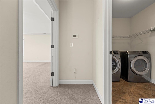 1635 Lake Wateree Dr, Florence, SC 29501 - laundry area featuring carpet floors, baseboards, washer and clothes dryer, and laundry area