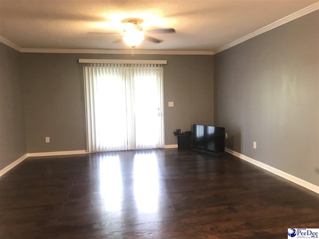 1424 Golf Terrace Blvd, Florence, SC 29501 - spare room featuring dark wood-type flooring, a ceiling fan, and crown molding