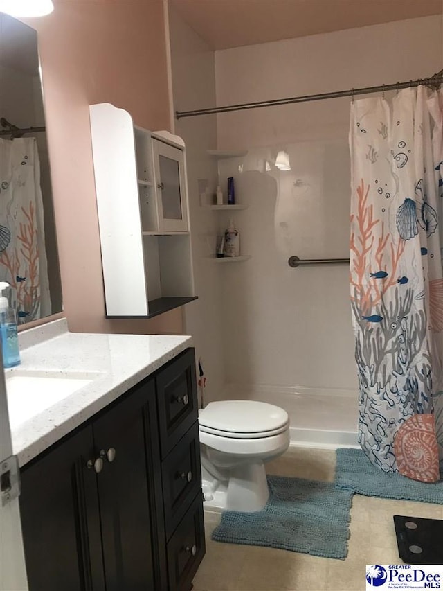 1424 Golf Terrace Blvd, Florence, SC 29501 - full bathroom featuring vanity, tile patterned floors, and a shower with curtain
