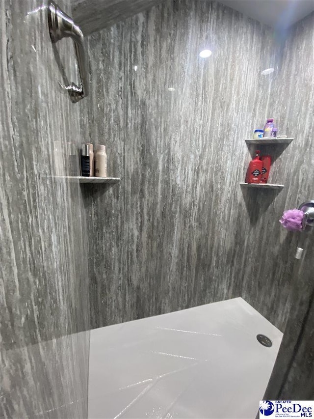 bathroom with walk in shower