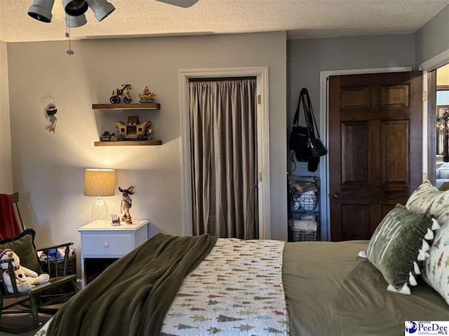 bedroom featuring a textured ceiling