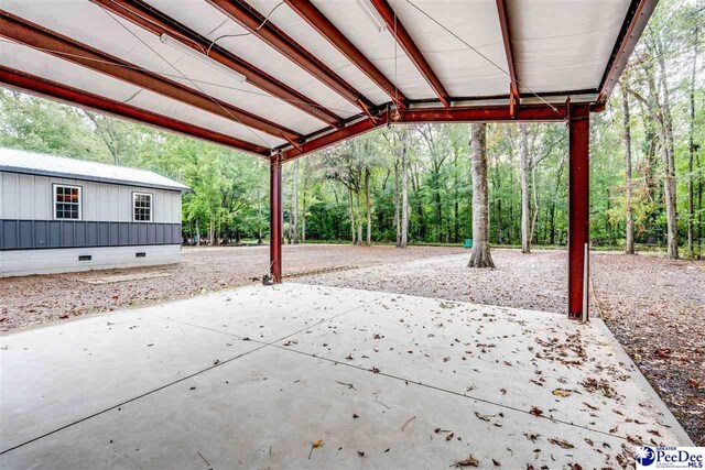 view of patio / terrace featuring an outbuilding