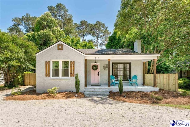 1314 Sewanee Ave, Florence, SC 29501 - view of front of property featuring covered porch and a chimney