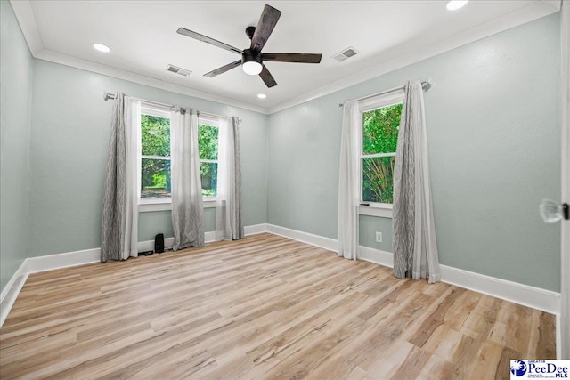 1314 Sewanee Ave, Florence, SC 29501 - unfurnished room featuring healthy amount of natural light, ornamental molding, wood finished floors, a ceiling fan, and baseboards