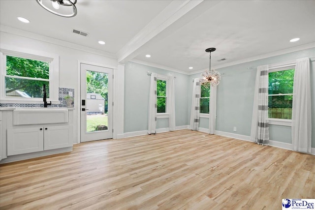 1314 Sewanee Ave, Florence, SC 29501 - unfurnished dining area with ornamental molding, a chandelier, light wood finished floors, baseboards, and recessed lighting