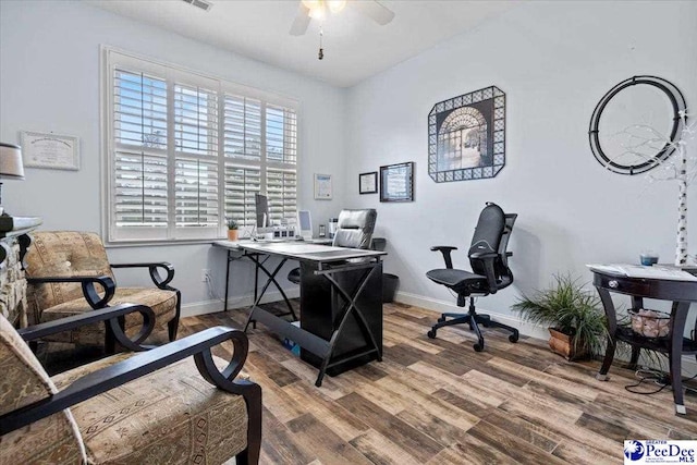 office area with hardwood / wood-style flooring and ceiling fan