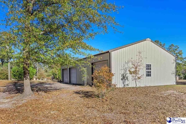 view of outbuilding with a garage