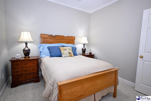 carpeted bedroom with ornamental molding