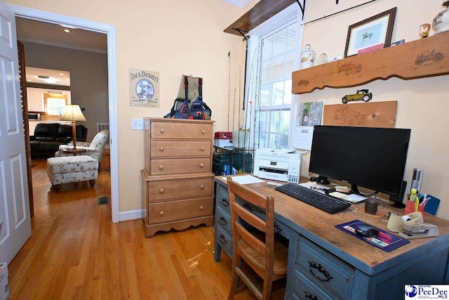 home office featuring light hardwood / wood-style floors