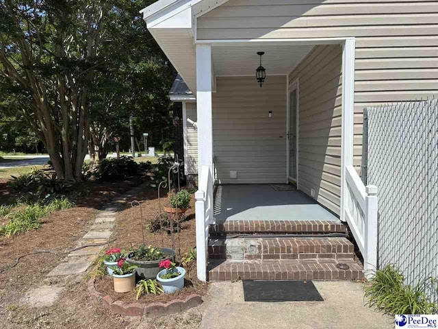 918 Fore Rd, Florence, SC 29506 - property entrance featuring covered porch