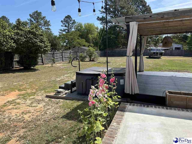 918 Fore Rd, Florence, SC 29506 - view of yard with a deck, a jacuzzi, a pergola, and a fenced backyard