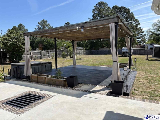 918 Fore Rd, Florence, SC 29506 - view of patio with a deck, a covered hot tub, and a fenced backyard
