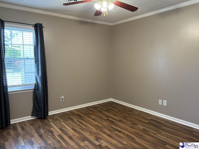 918 Fore Rd, Florence, SC 29506 - spare room featuring crown molding, dark wood finished floors, baseboards, and a ceiling fan