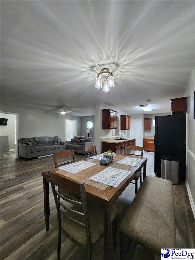 dining room with wood finished floors