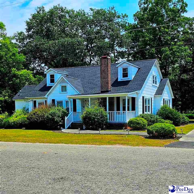 cape cod home with covered porch