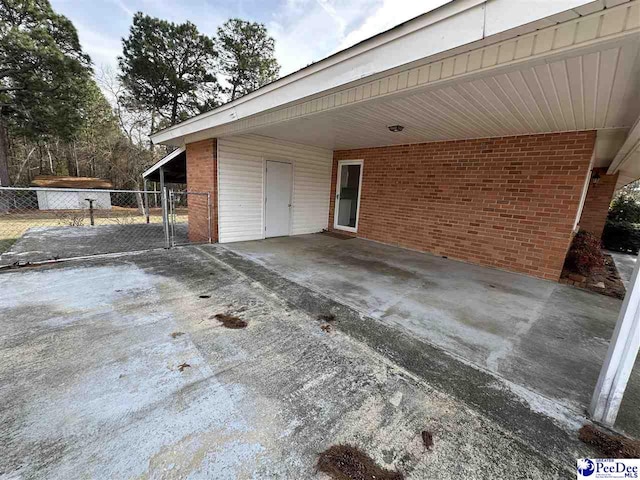 view of patio with a carport