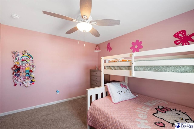 carpeted bedroom featuring a ceiling fan and baseboards