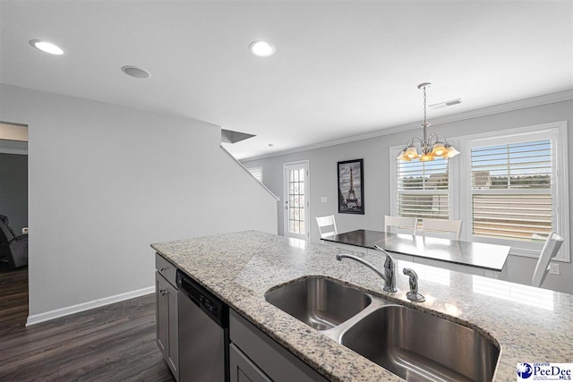 kitchen with ornamental molding, visible vents, a sink, and stainless steel dishwasher