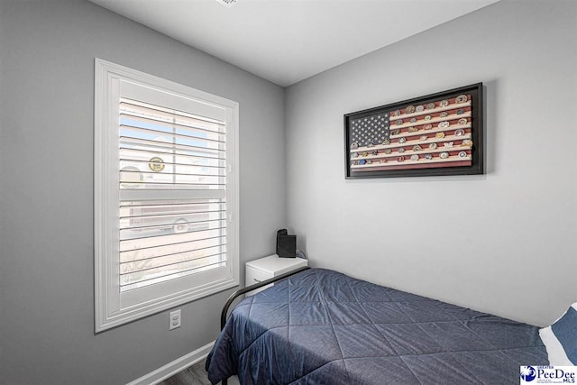 bedroom with baseboards