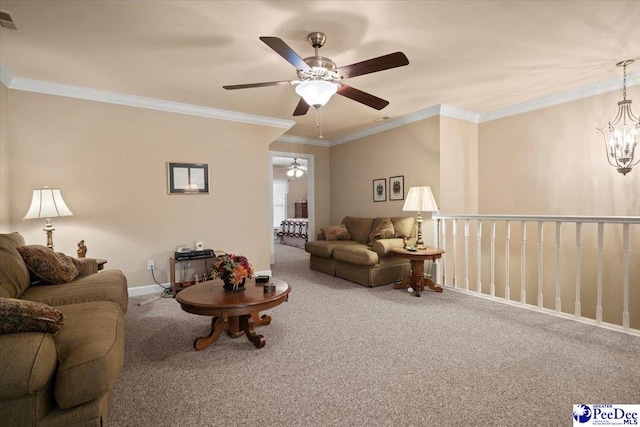 carpeted living room featuring crown molding and ceiling fan with notable chandelier