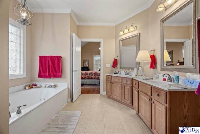 bathroom with ornamental molding, tile patterned floors, vanity, and a washtub