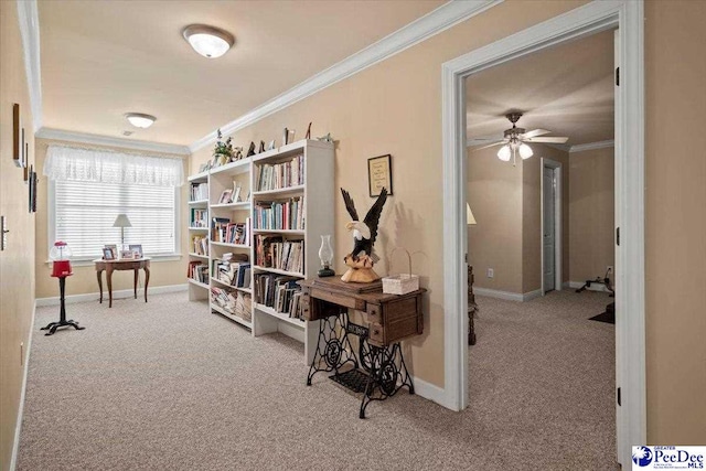 interior space featuring ornamental molding and carpet