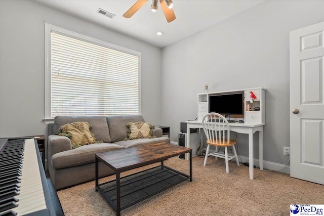 1850 Wax Myrtle Dr, Florence, SC 29501 - living area with ceiling fan, light colored carpet, and baseboards