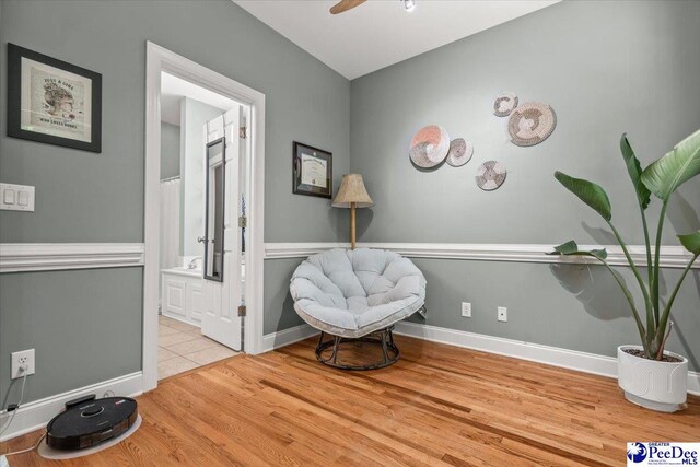 1850 Wax Myrtle Dr, Florence, SC 29501 - sitting room featuring wood finished floors, ceiling fan, and baseboards