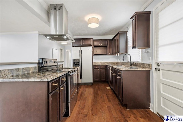 kitchen featuring light stone counters, ornamental molding, stainless steel appliances, and island exhaust hood