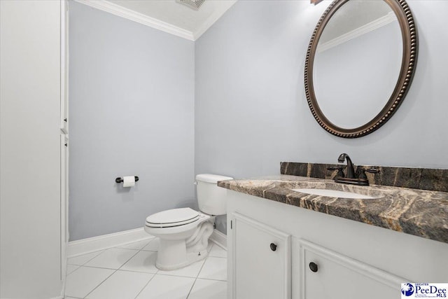 bathroom featuring vanity, tile patterned flooring, ornamental molding, and toilet