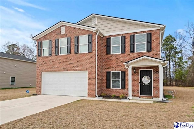 view of front of house featuring a garage, driveway, a front lawn, and brick siding