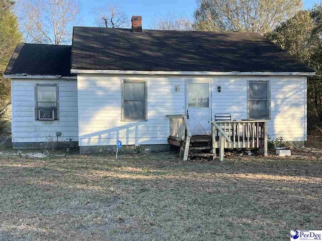 view of front of home featuring cooling unit