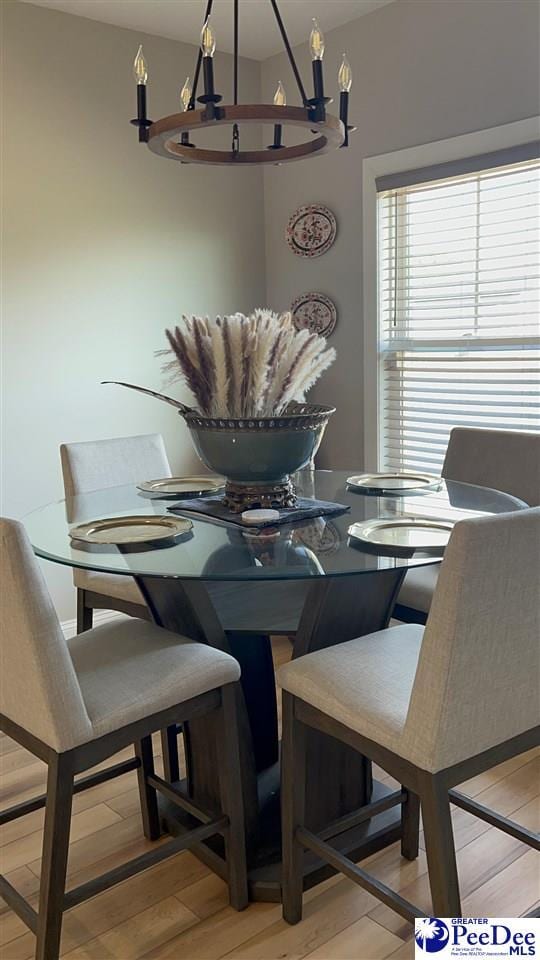 dining room with light wood-style flooring