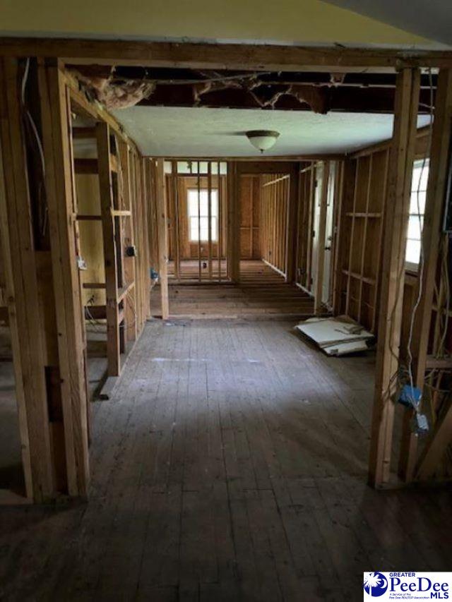 misc room with wood-type flooring